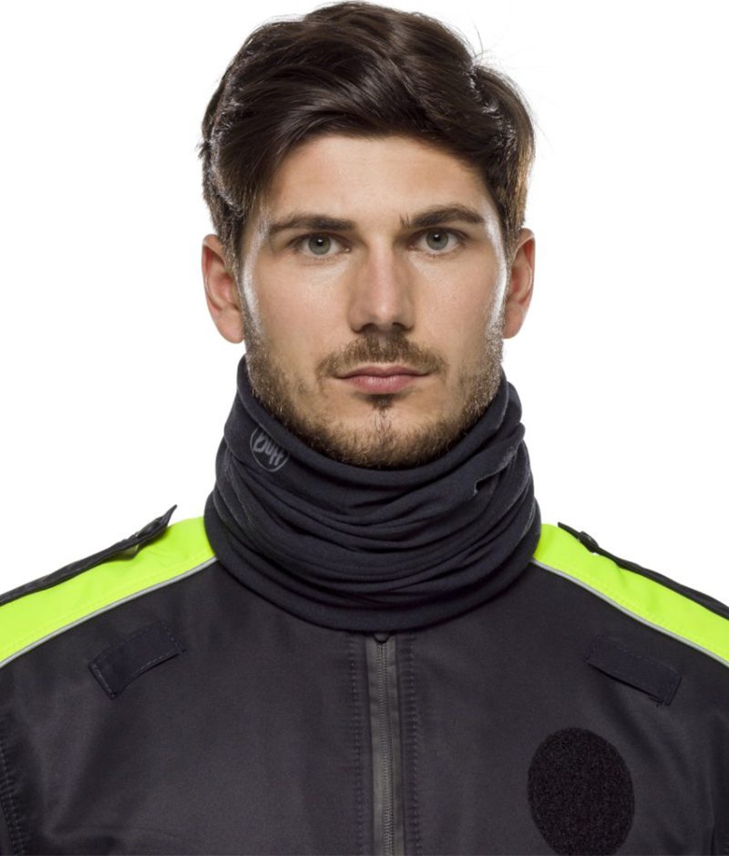 Studio photo of the Cut+Fire Resistant BUFF® Design "Solid Paris Blue” worn by a police officer as scarf. Source: buff.eu