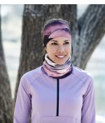 Winter photo of a Woman wearing the BUFF® Original Multifunctional Headwear Design “Serra Mauve” as a scarf. Source: buff.eu